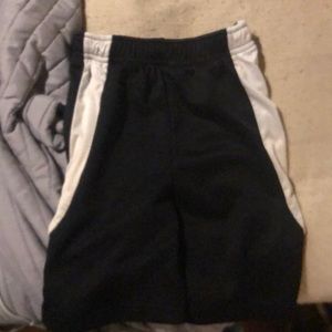 Multiple shorts and a pair of pants anywhere from 4-5T hardly worn